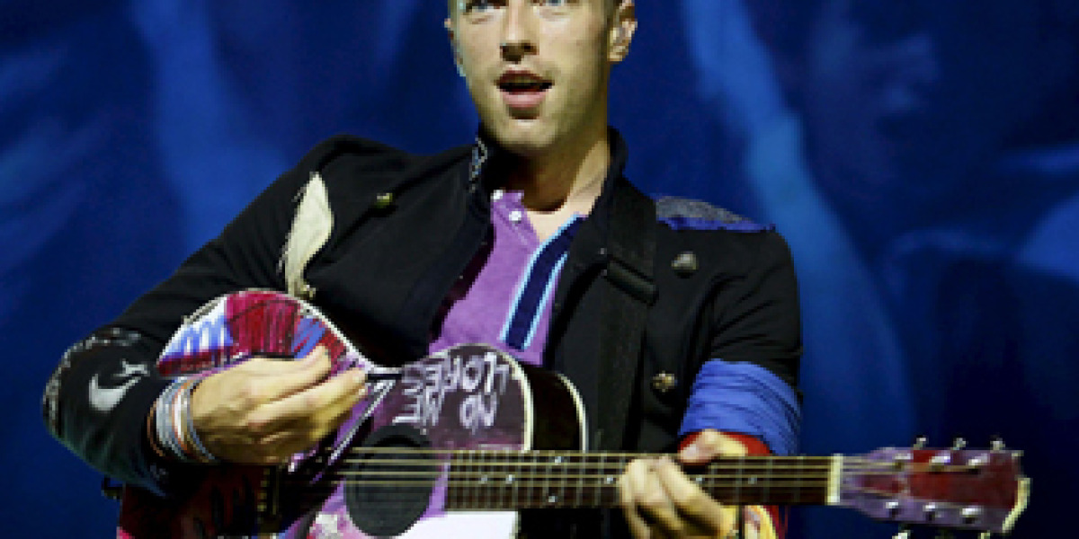 Coldplay durante el concierto en el Palau Sant Jordi de Barcelona